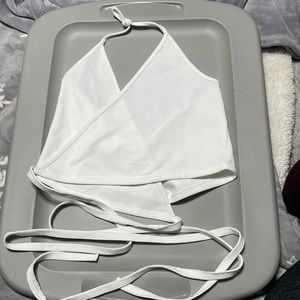 Women wrap around shirt, brand is Garage and size is medium.